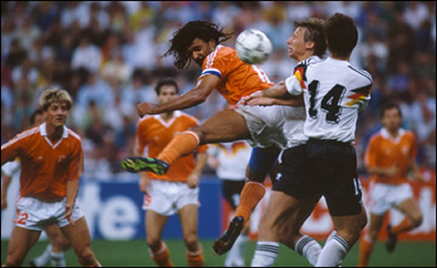 Ruud Gullit fighting in the air and heading the ball, in a game between Holland and Germany