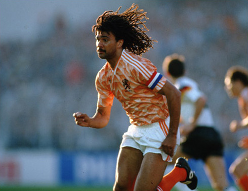 Ruud Gullit running on the football fields as Netherlands captain