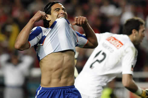 Radamel Falcao pulling off his jersey, becoming shirtless and showing his six pack abdominals