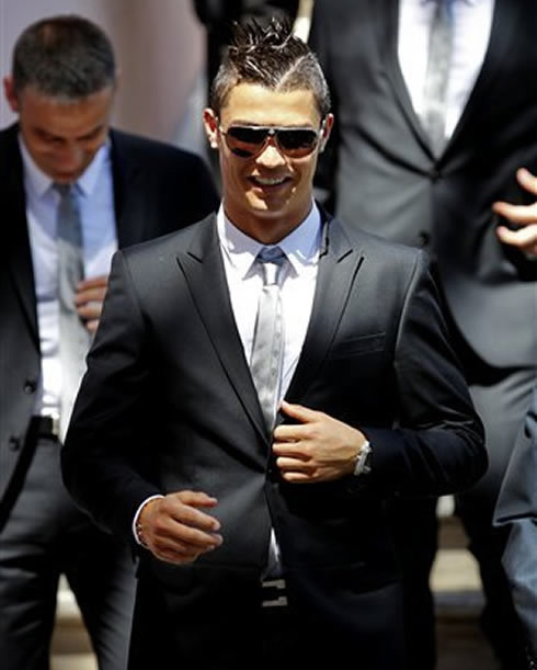 Cristiano Ronaldo looking like secret agent 007, in a black suit with black sunglasses, at the EURO 2012