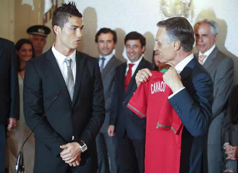 Cristiano Ronaldo offering a Portuguese National Team jersey to Aníbal Cavaco Silva, the Portuguese President in 2012