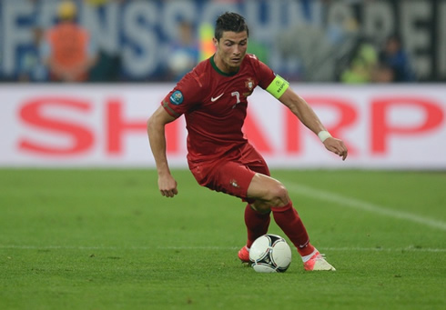 Cristiano Ronaldo switching direction as he runs with the ball in Portugal 0-1 Germany, for the EURO 2012
