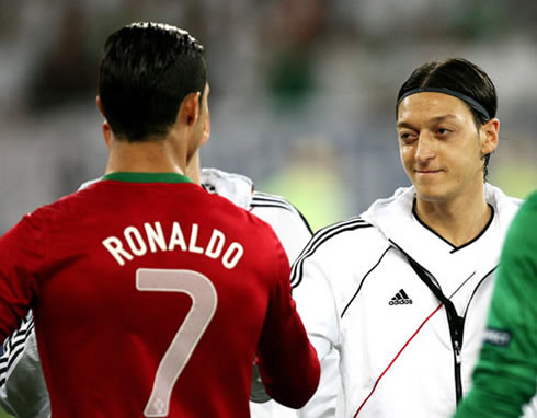 Cristiano Ronaldo and Mesut Ozil saluting each other in Portugal vs Germany, during the EURO 2012