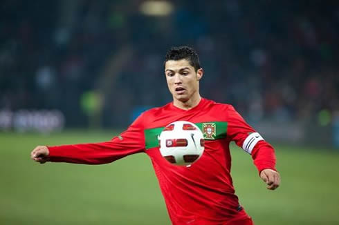 Cristiano Ronaldo looking at the ball as he prepares to control it