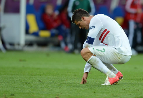 Cristiano Ronaldo looking down after missing a good chance to score for Portugal against Denmark, in the EURO 2012