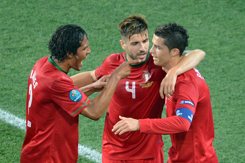 Cristiano Ronaldo celebrating goal with Bruno Alves and Miguel Veloso, in the EURO 2012