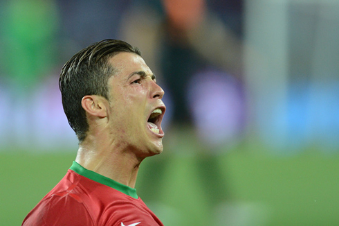 Cristiano Ronaldo screaming and yelling for Portugal, at the EURO 2012, with his typical second half hairstyle