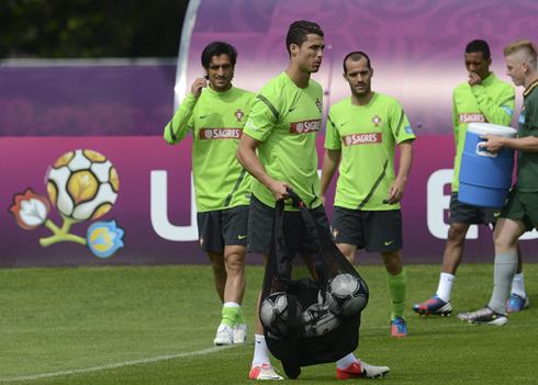 Cristiano Ronaldo carrying the bag of soccer balls, at the Portuguese National Team training and practice session, for the EURO 2012