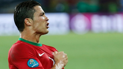 Cristiano Ronaldo showing his love and passion for Portugal, after scoring a goal in the EURO 2012