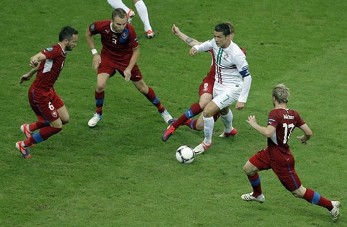 Cristiano Ronaldo in the middle of plenty of Czech Republic defenders, at the EURO 2012