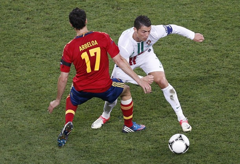 Cristiano Ronaldo dribbling Alvaro Arbeloa in the EURO 2012 semi-finals, between Portugal and Spain