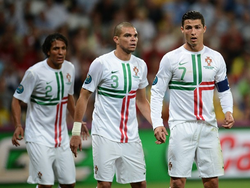Cristiano Ronaldo, Pepe and Bruno Alves, preparing for a corner in Portugal vs Spain, at the EURO 2012