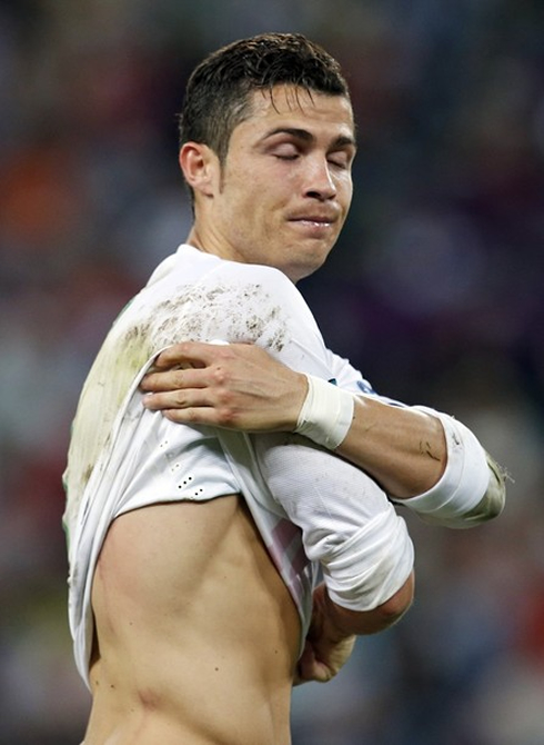 Cristiano Ronaldo pulling his shirt off, and showing his body uncovered, in Portugal vs Spain, at the EURO 2012 semi-finals