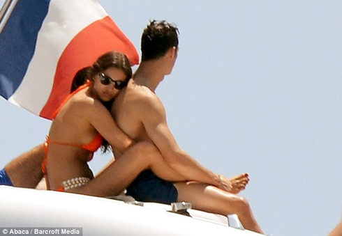 Irina Shayk wrapping her legs around Cristiano Ronaldo, in the Summer of 2012