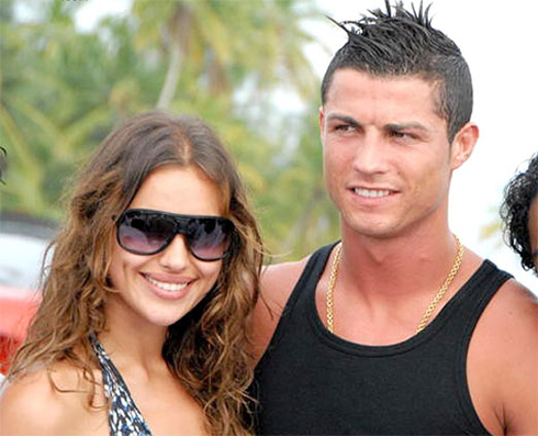 Cristiano Ronaldo in a slieveless shirt, with Irina Shayk, on their 2012 holidays