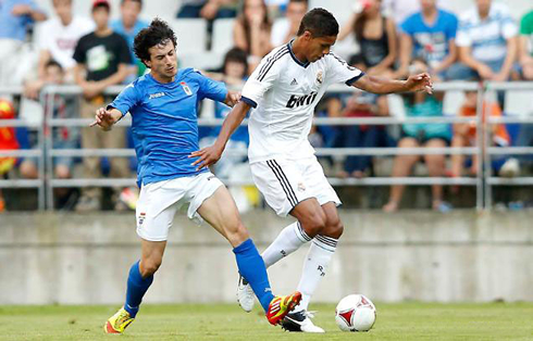 Varane defending for Real Madrid, during the pre-season of 2012-2013