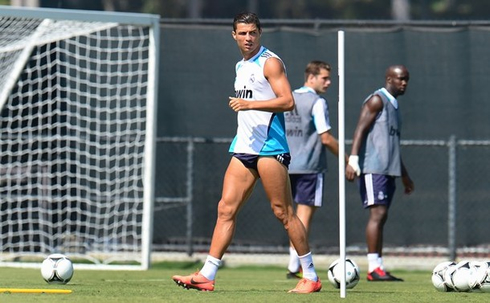 Cristiano Ronaldo showing off his long legs, after pulling his shorts up, in Real Madrid pre-season training, 2012-13