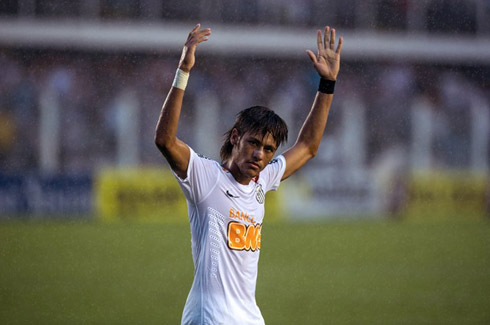 Neymar asking for support from the crowd in Brazil, during a game for Santos in 2012