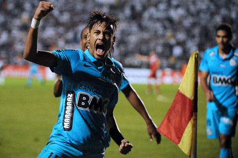 Neymar joy in goal celebrations, with his hair all wet and spiked, in 2012