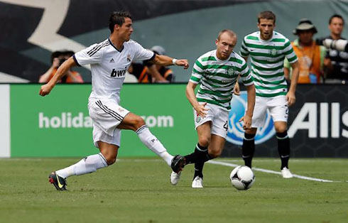 Cristiano Ronaldo making a pass, in a game for Real Madrid in 2012-2013