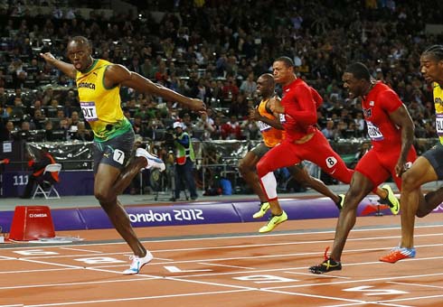 Usain Bolt winning the 100m sprint in the London 2012 Olympics, with a large margin to the rest of the runners