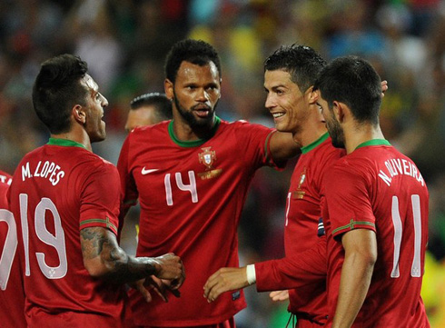 Cristiano Ronaldo, Miguel Lopes, Rolando and Nélson Oliveira, smiling after Portugal scored the second goal against Panama, in 2012