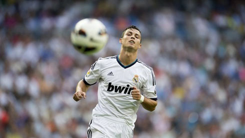 Cristiano Ronaldo chasing a ball in a match for Real Madrid in 2012/2013