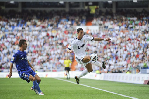 Cristiano Ronaldo perfect ball control in soccer match between Real Madrid vs Valencia, in 2012-2013