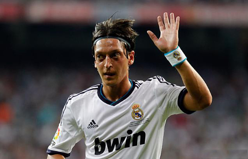 Mesut Ozil playing for Real Madrid against Barcelona, in 2012-2013