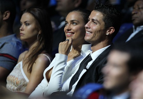 Cristiano Ronaldo and Irina Shayk smiling, at the UEFA Best Player in Europe 2012-2013 gala