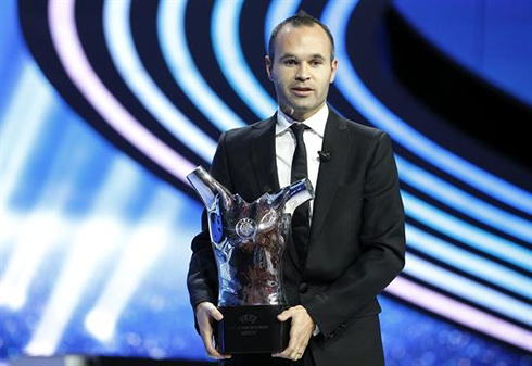 Andrés Iniesta winning the UEFA Best Player in Europe trophy, in 2012