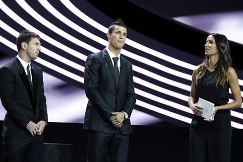 Cristiano Ronaldo and Lionel Messi answering questions from Melanie Winiger, in 2012