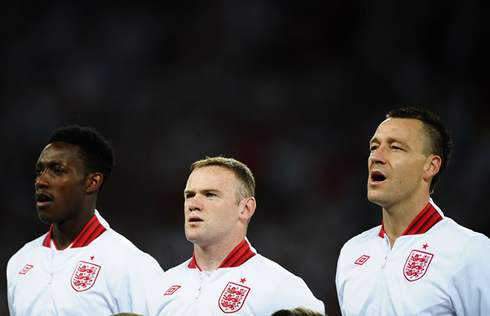 Danny Welbeck, Wayne Rooney and John Terry, chanting the English National Anthem, in 2012