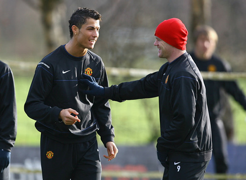 Cristiano Ronaldo playing with Wayne Rooney, in a Manchester United training session