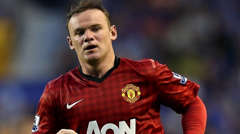 Wayne Rooney playing with the new Manchester United jersey for 2012-2013