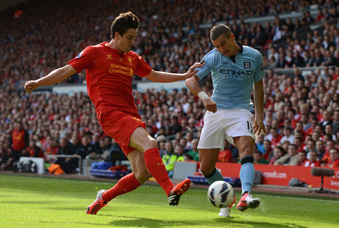 Kolarov making a cross in Liverpool vs Manchester City