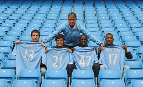 Roberto Mancini presenting Manchester City signings, Kolarov, David Silva, Yaya Touré and Boateng