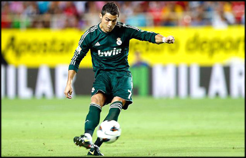 Cristiano Ronaldo playing for Real Madrid against Sevilla and wearing the new green jersey, uniform, kit and shirt, in 2012-2013