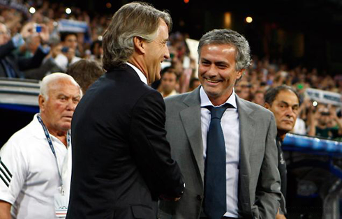 José Mourinho and Roberto Mancini greeting each other in Real Madrid vs Manchester City, for the UEFA Champions League in 2012-2013