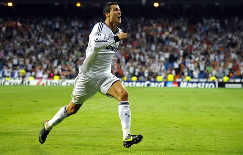 Cristiano Ronaldo running in the Santiago Bernabéu to go meet the fans and celebrate the late winning goal, in Real Madrid 3-2 Manchester City, in 2012-2013