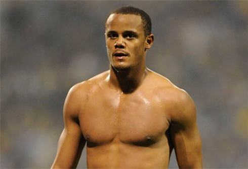 Vincent Kompany shirtless and naked, showing his chest muscles, in 2012