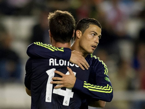 Cristiano Ronaldo hugging Xabi Alonso after a goal, in Real Madrid vs Rayo Vallecano in 2012-2013