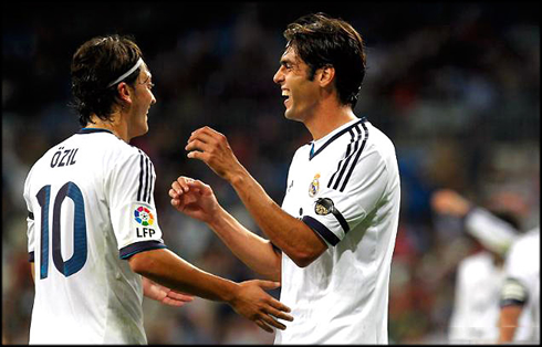 Mesut Ozil and Ricardo Kaká celebrating a goal in Real Madrid, in 2012-2013