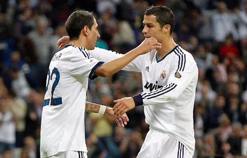 Cristiano Ronaldo and Angel di María, preparing to hug each other in Real Madrid 2012-2013