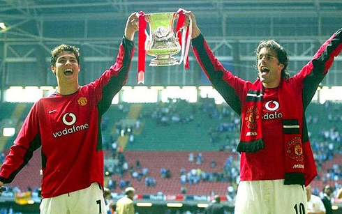 Cristiano Ronaldo and Ruud van Nistelrooy, lifting the Barclays English Premier League title and trophy, in 2003