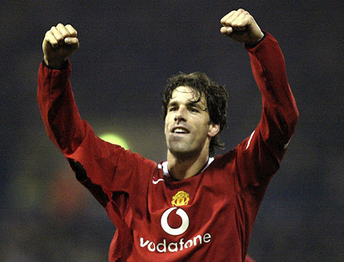 Ruud van Nistelrooy raising his two arms in the air towards Manchester United fans
