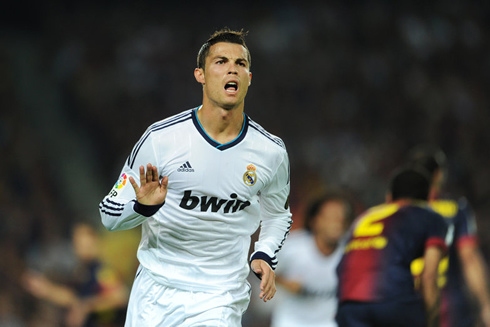 Cristiano Ronaldo celebrating goal vs Barcelona with his hand demanding Barça fans to be calm and quiet, in La Liga 2012-2013