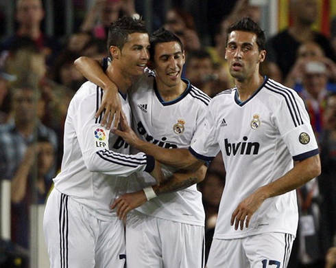 Cristiano Ronaldo hugging Angel di María and Arbeloa, in Real Madrid goal celebrations against Barcelona, in 2012-2013