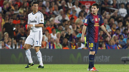Cristiano Ronaldo and Lionel Messi, standing near each other, in Barcelona vs Real Madrid for La Liga 2012-2013