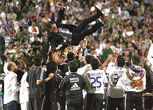 Fabio Capello being thrown to the air by Real Madrid players, after winning the Spanish League La Liga dramatically in 2006-2007